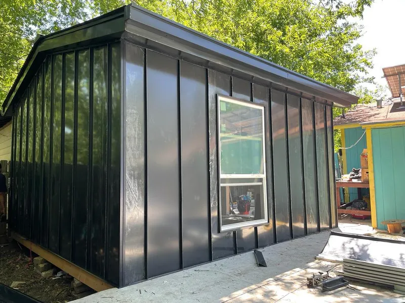 Black standing seam metal wall panels for Metal Roof Installation in Plymouth